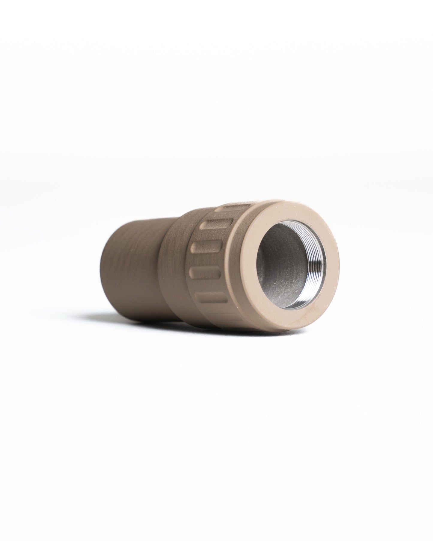 TISHA 5.56 suppressor mounted on rifle