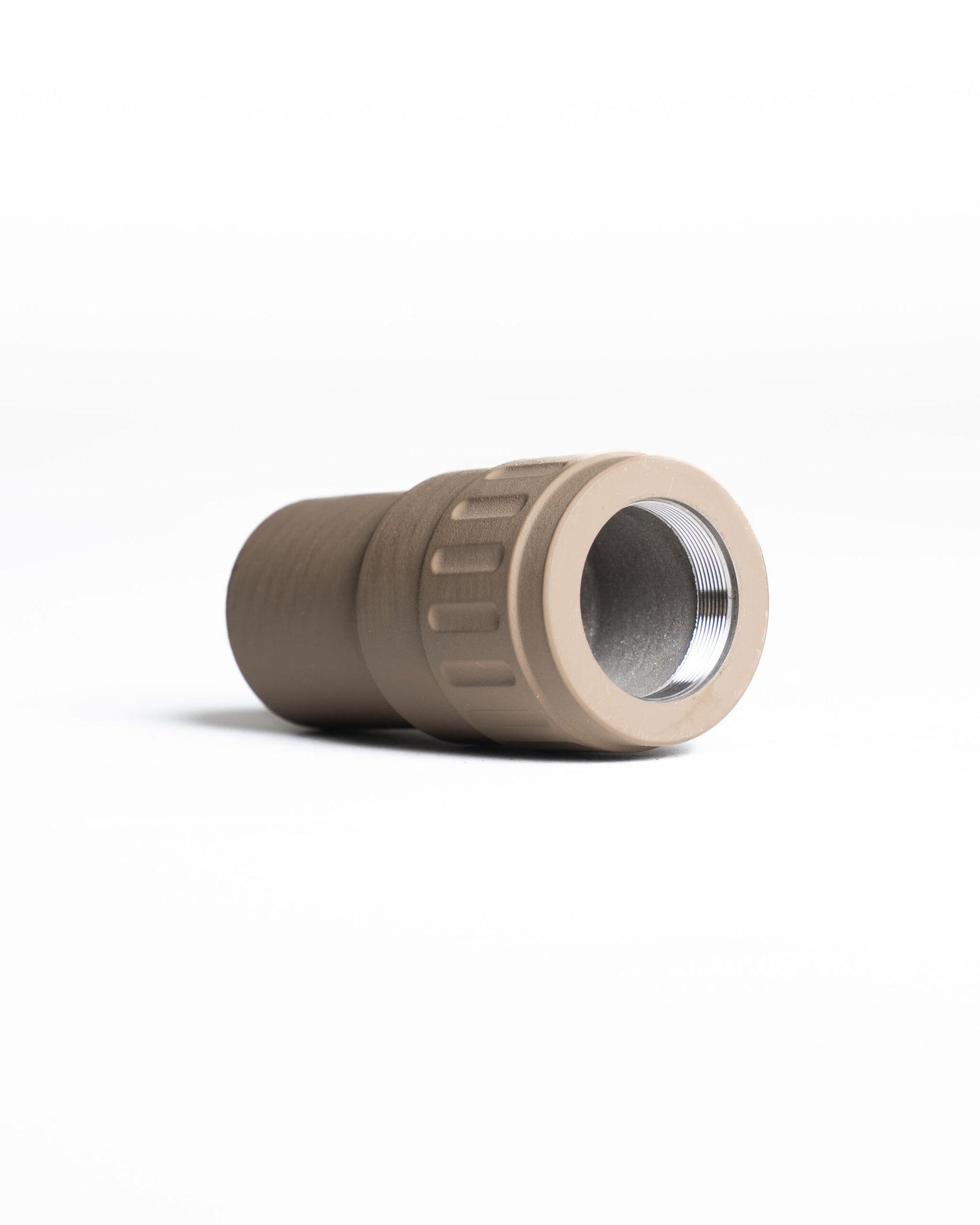 TISHA 5.56 suppressor mounted on rifle