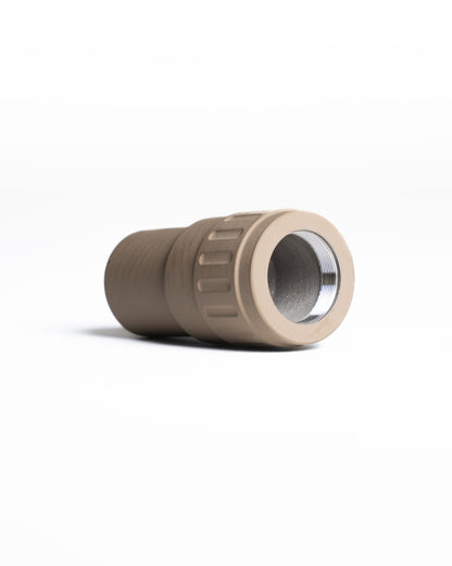 TISHA 5.56 suppressor mounted on rifle
